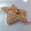 broche en perles